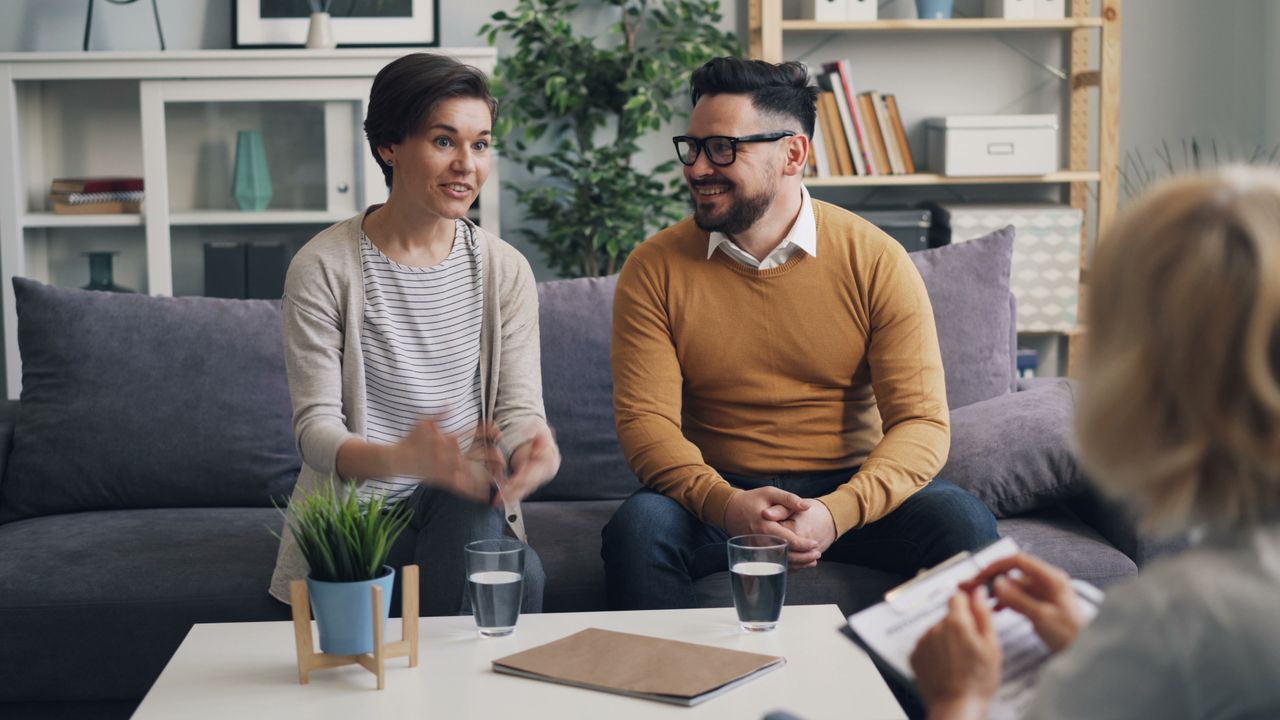 A supportive counseling conversation in a warm, welcoming office